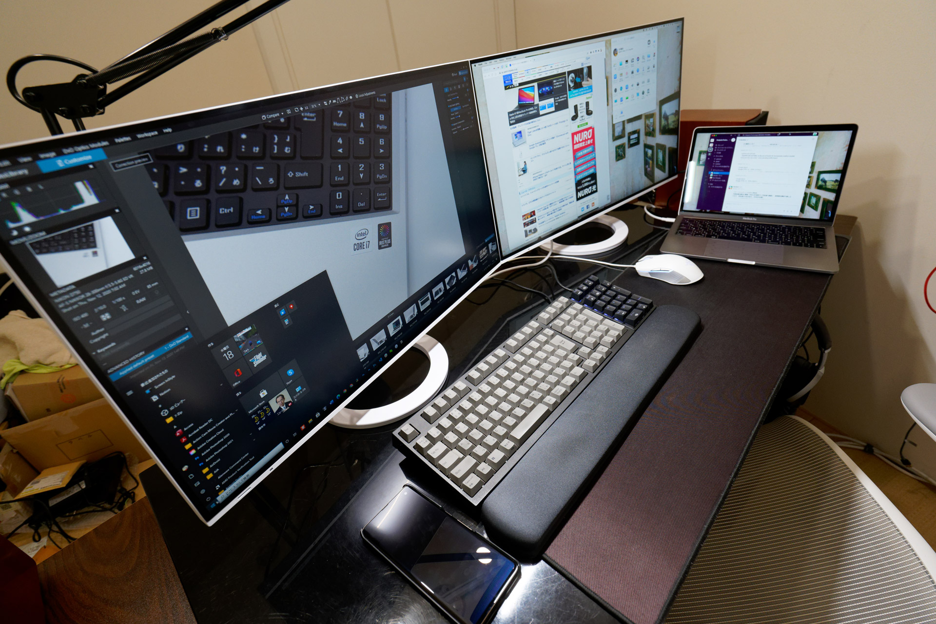 I can also display the screen from the monitor on the left, which is connected to my desktop PCs, on my MacBook and operate them simultaneously. I use the MacBook Pro's keyboard and trackpad when I do this.