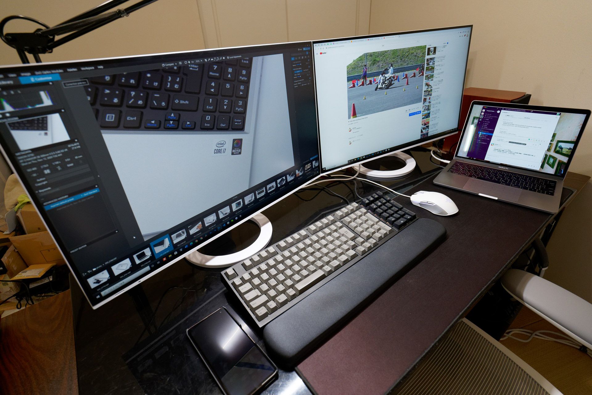 I could display the two desktop PCs and the MacBook Pro on separate monitors, but this would not allow me to share my keyboard and mouse with the second desktop PC.
